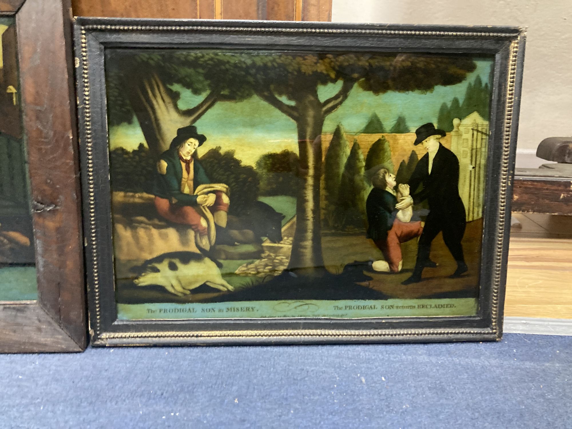 Two early 19th century coloured reverse glass prints, The Prodigal Son in Misery and The Prodigal Son returns Reclaimed, 25 x 35cm an